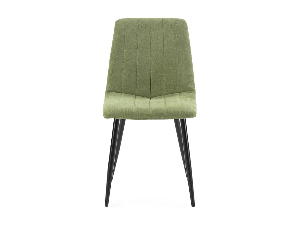 Vier stoelen van Sagi bekleed met groene stof. VS Venta-stock