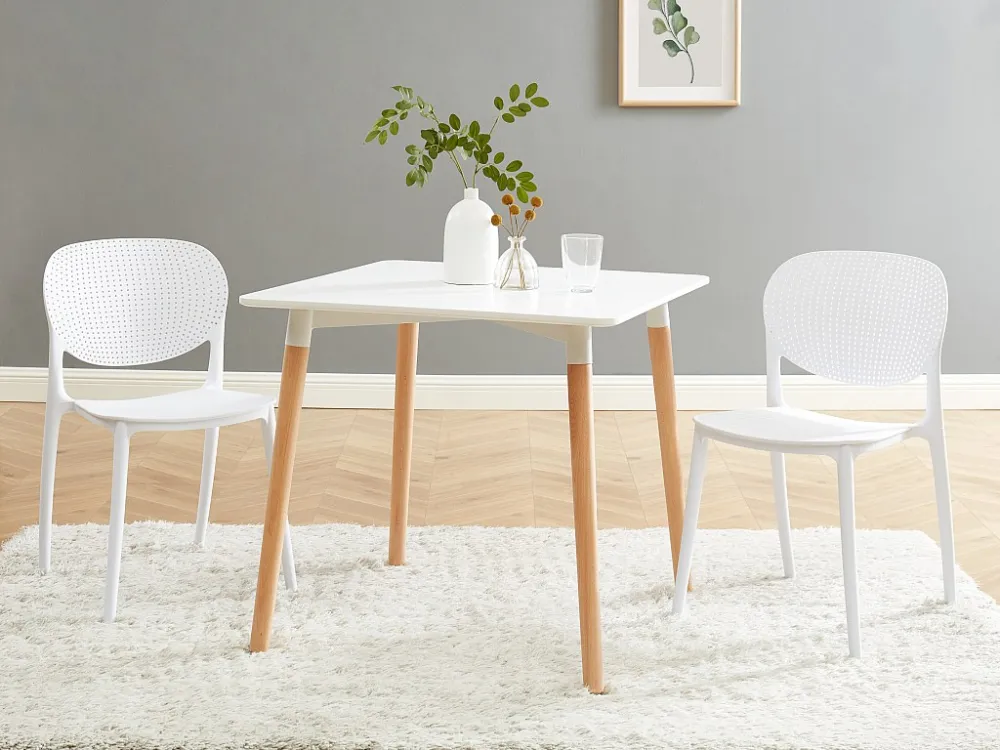Set van 6 polypropyleen stapelstoelen - Wit - CARETANE - Koop nu eenvoudig en goedkoop