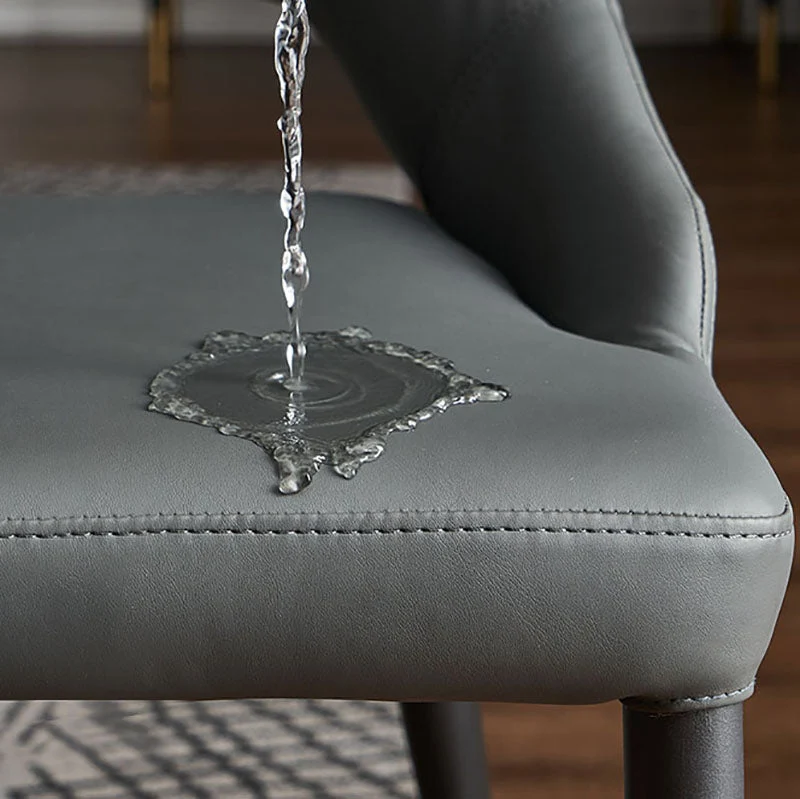 Met leer beklede eetkamerstoelen zonder armleuningen, zijstoelen met open achterkant en metalen poten Clearhalo