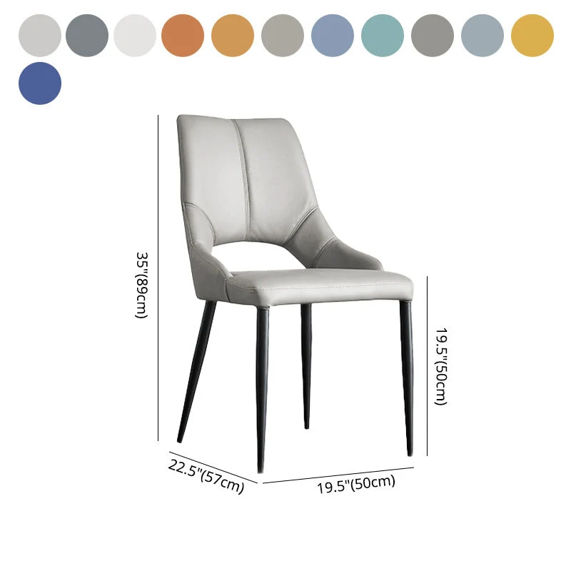 Met leer beklede eetkamerstoelen zonder armleuningen, zijstoelen met open achterkant en metalen poten Clearhalo