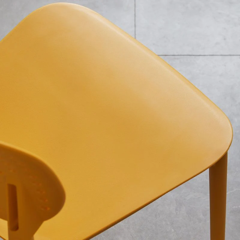 Minimalistisch design kunststof eetkamerstoel zonder armleuningen. Eetstoelen met open rug Clearhalo