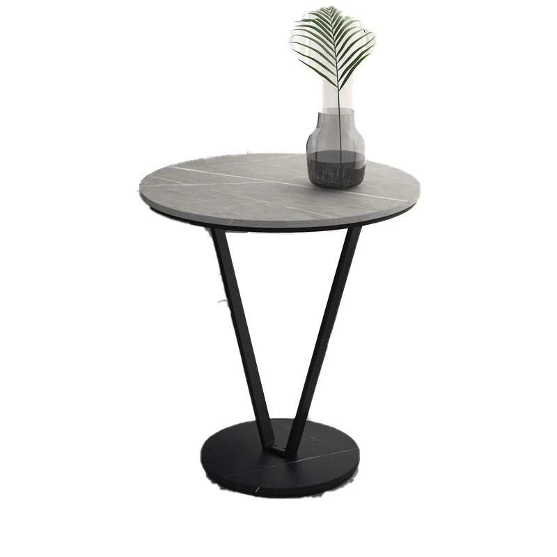 Minimalistisch rond bijzettafeltje met abstracte leisteen hoekbank Clearhalo