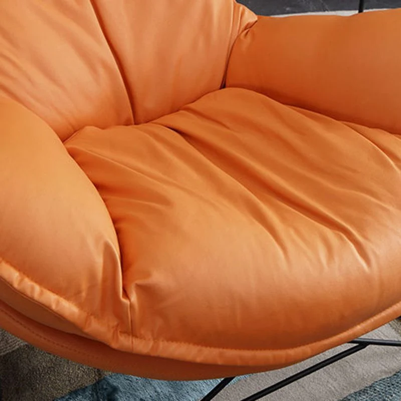 Moderne schommelstoel met stoffen bekleding en metalen frame voor binnen Clearhalo