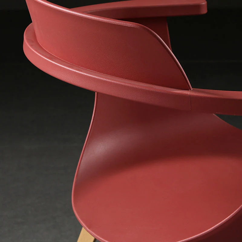 Moderne stoel met open achterkant, kunststof fauteuil met metalen onderstel voor eetkamer Clearhalo