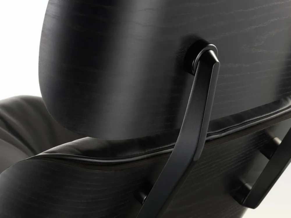 Vitra Eames Loungechair met ottoman Premium Leder Nero kastanje zwart